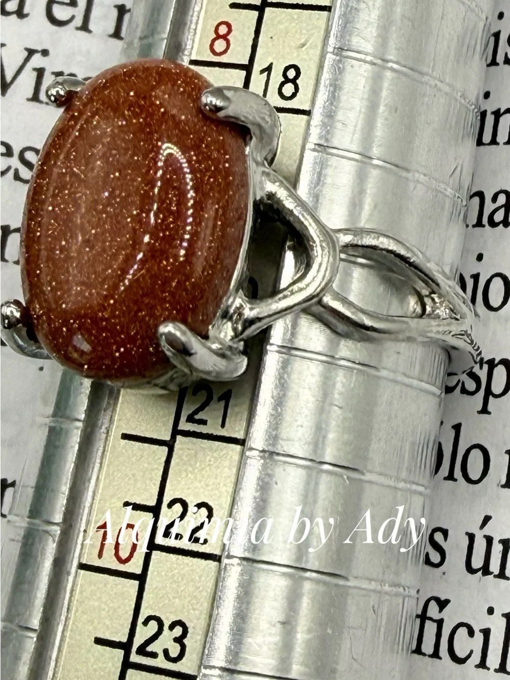 Sparkling Brown Goldstone Oval Ring in Silver-Tone Setting